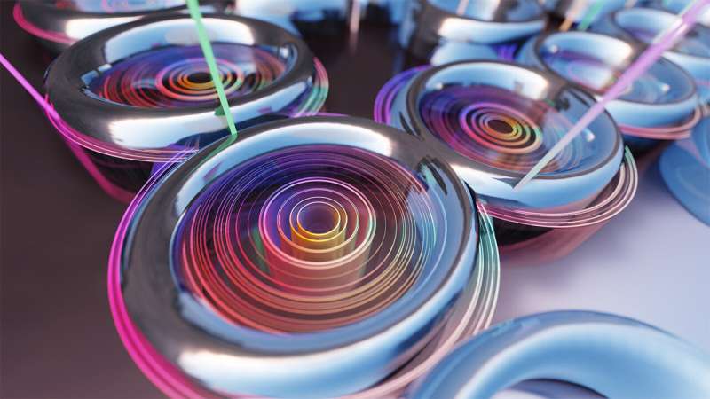 A new chip with hundreds of microscopic rings generated the first topological frequency comb. Credit: E. Edwards New Photonic Chip Spawns Nested Topological Frequency Comb