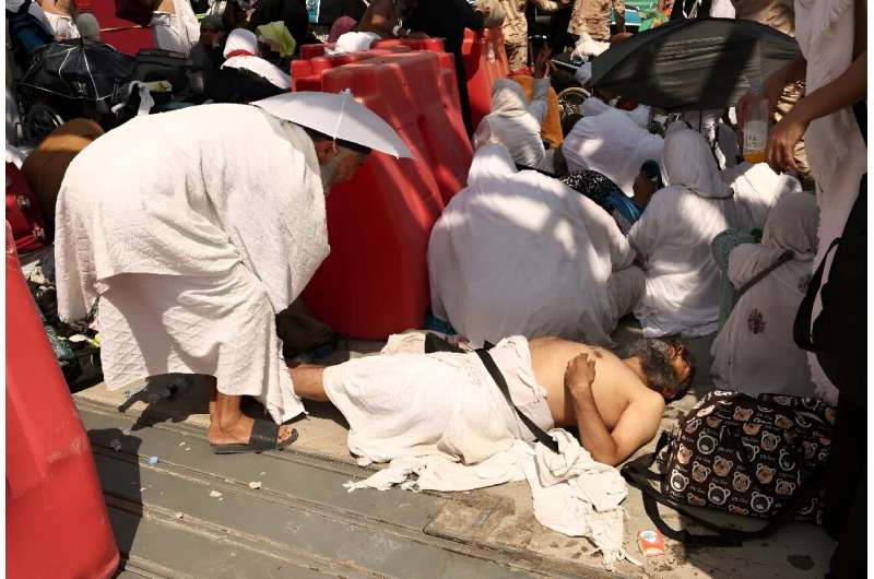 Pilgrims at the hajj were laid low by the scorching heat. Pilgrims at the hajj were laid low by the scorching heat